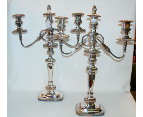 A pair of silver plated three-light candelabra, 55cm high Condition Report: Available upon request