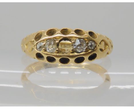 An 18ct gold five stone diamond ring hallmarked Birmingham 1901, finger size K, weight 2.8gms (one diamond missing) Condition