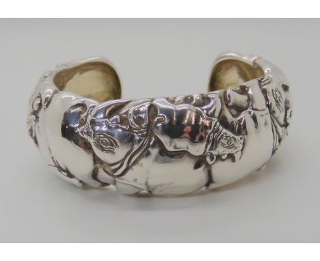 A rare silver Rhino cuff bangle by Zimbabwe artist and silver sculptor Patrick Mavros, dimensions 2.4cm x 6.8cm, inner dimens