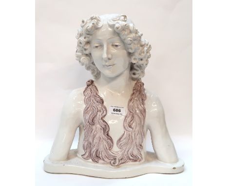 A Cantigalli maiolica bust of a young man in the manner of Della Robbia circa 1880, 38cm high Condition Report: Available upo