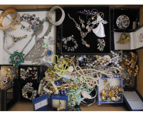 A large box full of vintage and modern costume jewellery Condition Report: Not available for this lot