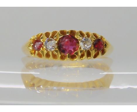 An 18ct gold red gem and diamond ring, hallmarked Birmingham 1918, size M, weight 3.7gms Condition Report: Available upon req