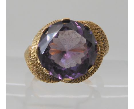 A 14k faux amethyst set ring, size L, weight 5gms Condition Report: Available upon request