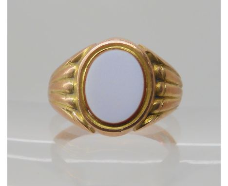 A 9ct agate set signet ring, size Q1/2, weight 6.2gms Condition Report: Available upon request
