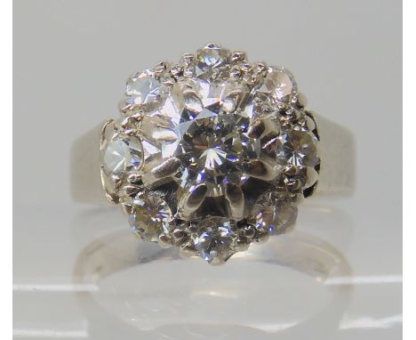 An 18ct white gold diamond cluster ring set with estimated approx 1ct of brilliant cut diamonds the centre diamond is 0.50cts