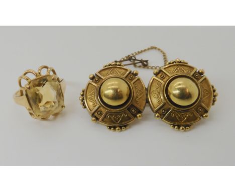 A bright yellow metal citrine set ring, size J, together with a Victorian yellow metal brooch, weight combined 11gms Conditio