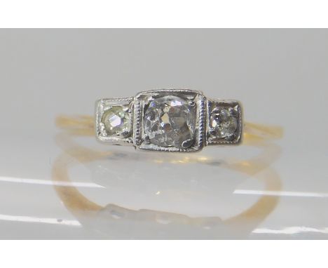 An 18ct gold vintage three stone diamond ring set with estimated approx 0.20cts of old cut diamonds, size K, weight 2gms Cond