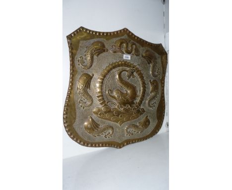 A large Poole of Hayle Shield with dolphins and mythical sea serpent, approx 55 cms