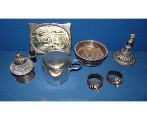 A silver plated bottle Coaster, pepper grinder, photo frame and an invalid lidded mug together with a pair of enamelled Bee n