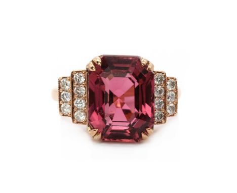 A rose gold pink tourmaline and diamond ring, an octagonal step cut pink tourmaline, approximately 12.60 x 9.60mm, claw set, 