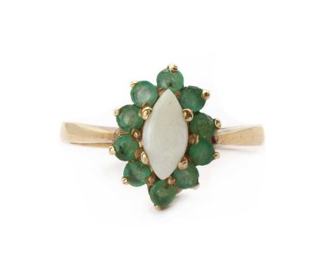 A 9ct gold opal and emerald cluster ring, a marquise shaped cabochon opal, to surround of round mixed cut emeralds, all claw 