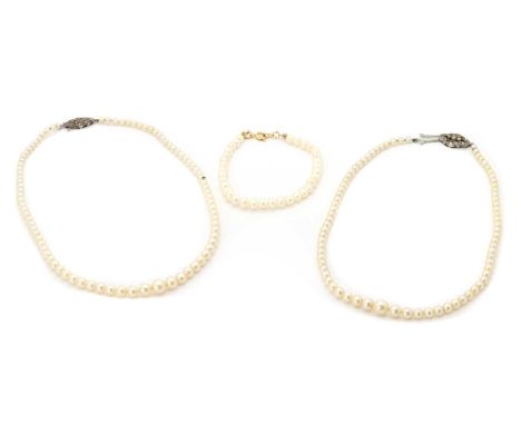 Two graduated cultured pearl necklaces, one 7.35 to 3.60mm in size, 375mm long, the other 7.32mm to 3.21mm, 416mm long, both 