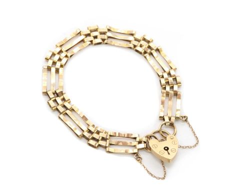 A 9ct gold gate bracelet, with a heart shaped padlock clasp, London 1970/71, approximately 176mm long, 8.79gCondition ReportC