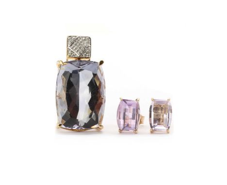 A gold amethyst and diamond pendant,cushion cut amethyst approximately 18 x 13mm, claw set, to an articulated diamond set bal