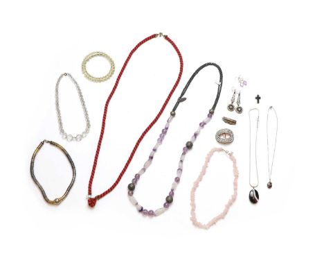 A large quantity of costume jewellery, to include an amethyst and white metal bead necklace, a rose quartz bead necklace, a c