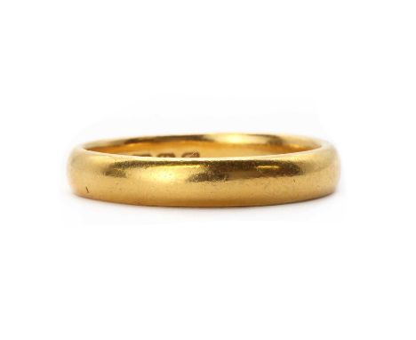 A 22ct gold wedding ring,light court profile, Birmingham 1931, approximately 4mm wide, 6.36g.Finger size TCondition ReportMak