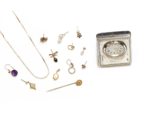 A collection of gold jewellery, to include a gold pin, with a round mixed cut sapphire, set to a surround of twisted wire and