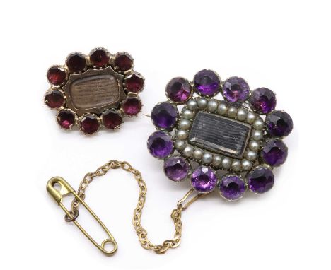 A Georgian rolled gold amethyst and split pearl memorial brooch,with woven hair to a glazed panel, to a border of split pearl