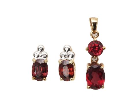 A gold rhodolite garnet pendant,with an oval mixed cut and a round mixed cut rhodolite garnet, claw set, to an articulated 'V