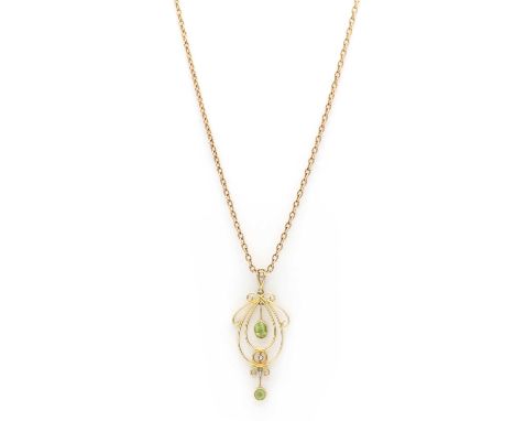 An Edwardian gold peridot and split pearl pendant,an oval mixed cut peridot drop, millegrain set, articulated on a knife edge