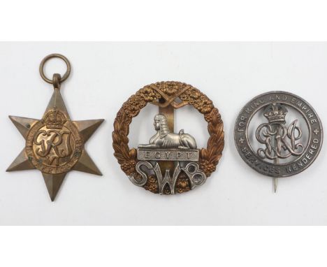 South Wales Borders cap badge, WWII Africa star and WWII silver wound badge numbered 497756. UK P&amp;P Group 1 (£16+VAT for 