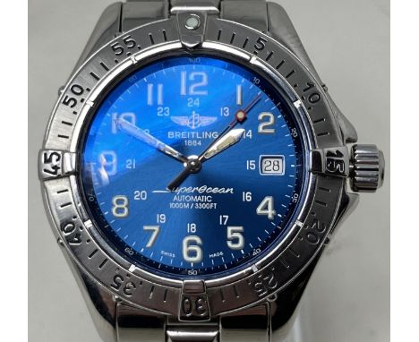 A gentleman's stainless steel Breitling Superocean Automatic 1000M/3300FT wristwatch, with a blue dial, boxed, with booklets 