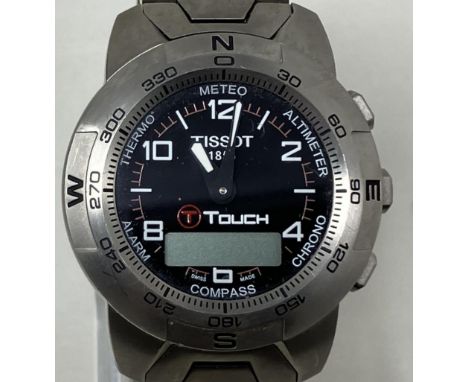 A gentleman's titanium Tissot T-Touch 253/353 wristwatch, boxedminute hand currently working, although no guarantee given, sm