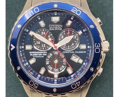 A gentleman's titanium Citizen Eco-Drive Chronograph wristwatch, boxed, with guarantee,  instructions and spare links, and th