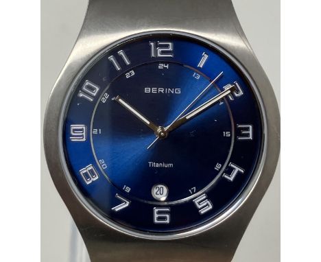 A ladies titanium Bering 11937-078 wristwatch, on a stainless steel mesh strap, in a glass case, with guarantee and instructi