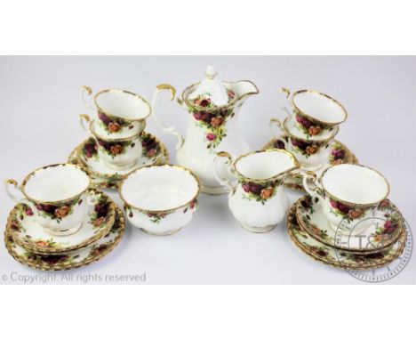 A Royal Albert Old Country Roses tea service comprising; six tea cups, saucers and cake plates, a milk jug, sugar bowl and wa