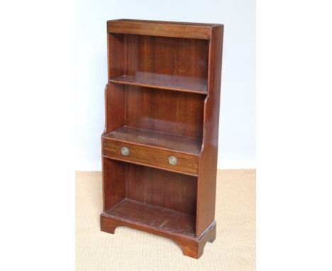A Regency style mahogany waterfall bookcase, with drawer, on bracket feet, 117cm H x 59cm W x 24cm D, with a George III style