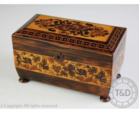 A late 19th century Tunbridge Ware rosewood two division tea caddy, the top decorated with a floral panel within a geometric 