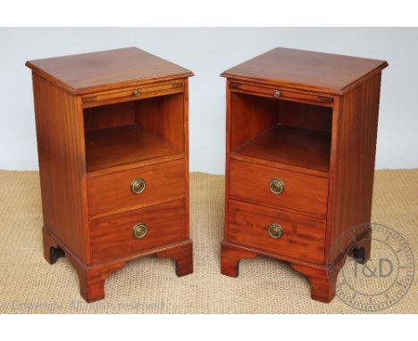 A pair of walnut bedside tables, late 20th century, each with a slide and two drawers, on bracket feet, 70cm H x 40cm W x 39c