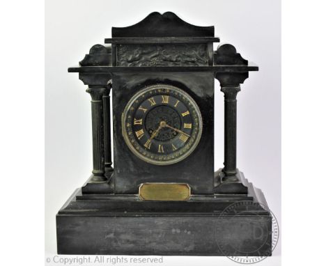 A late Victorian presentation mantel clock of architectural form, the central circular dial with gilt Roman numeral chapter r