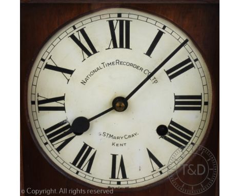 A National Time Recorder wall clock, oak cased and with pendulum and key, 63cm high