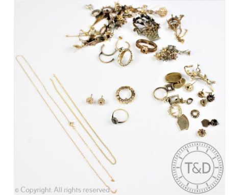 A quantity of assorted brooch mounts, ring parts and mounts, earring mounts and further un-set jewellery, chains etc, in yell