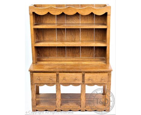 An apprentice oak dresser base and integral plate rack, 45.5cm H, 34.5cm W, 14.5cm D, with a Wedgwood Kutani Crane pattern mi