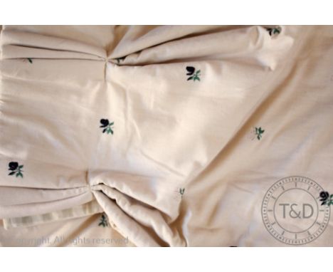 A set of three lined and interlined embroidered curtains, each decorated with floral sprigs against a cream ground, 185cm dro