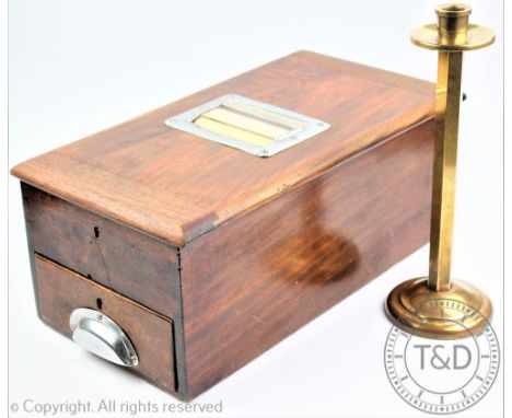 A vintage mahogany counter top till, 44cm long, with a brass hexagonal candlestick with lead weighted base, 31.5cm H, and a B