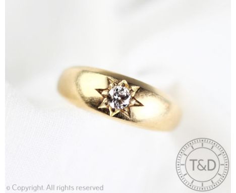 A diamond set ring, the old brilliant cut diamond gypsy set in 18ct yellow gold, weight 4.7gms, size J/K 