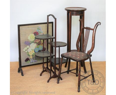 An Edwardian stained beech music chair, with lyre shaped back, 82cm H, with a pot cupboard, a folding cake stand and a jardin
