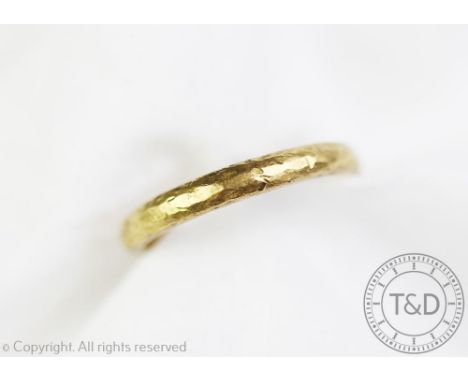 A Posy ring (posie or posey), the 22ct gold band of simple hammered design and engraved to the interior 'Amor Verus' (True lo