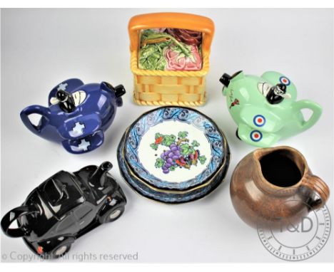 A selection of collectable ceramics to include three Carlton Ware novelty teapots, 'Blue Max' and 'Lucy May' aeroplanes and a