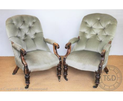 A pair of early Victorian stained wood library chairs, by repute originally from the Judges Chambers Shrewsbury, with button 