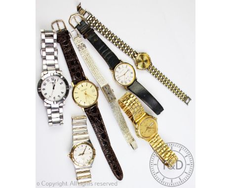 An Omega constellation wristwatch in stainless steel, white dial with batons, date dial and centre sweep seconds, Constellati