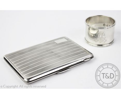 A silver cigarette case, London Assay Office, London 1950, the rectangular case with banded and engine turned cover with vaca