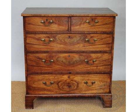 A George III mahogany chest, with two short and three graduated long drawers, with pine side panels, on bracket feet, 102cm H