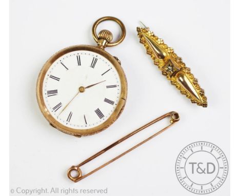A 14K ladies fob watch, the white enamel dial with black Roman numerals, inner case stamped '14K', a Victorian rose cut diamo