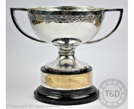 An Art Deco silver two handled trophy, Manoah Rhodes & Sons Ltd, London 1922, the planished body with Celtic design banding a