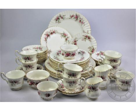 A Royal Albert Lavender Rose pattern tea and dinner service comprising; six dinner plates, nine plates, ten side plates, ten 